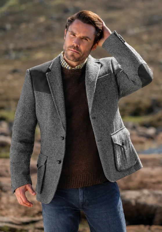 Men's tweed blazer, grey textured tweed slim-fit close-up fabric and pocket detail