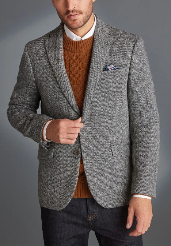 Men's herringbone tweed blazer, black wool-blend fabric slim-fit back view with structured silhouette
